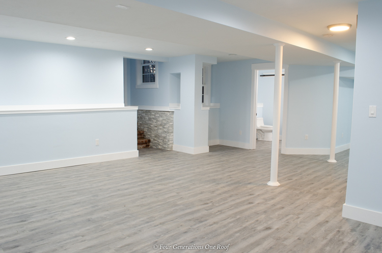Basement remodel with gray Rigid Core Vinyl Planking by Select Surfaces