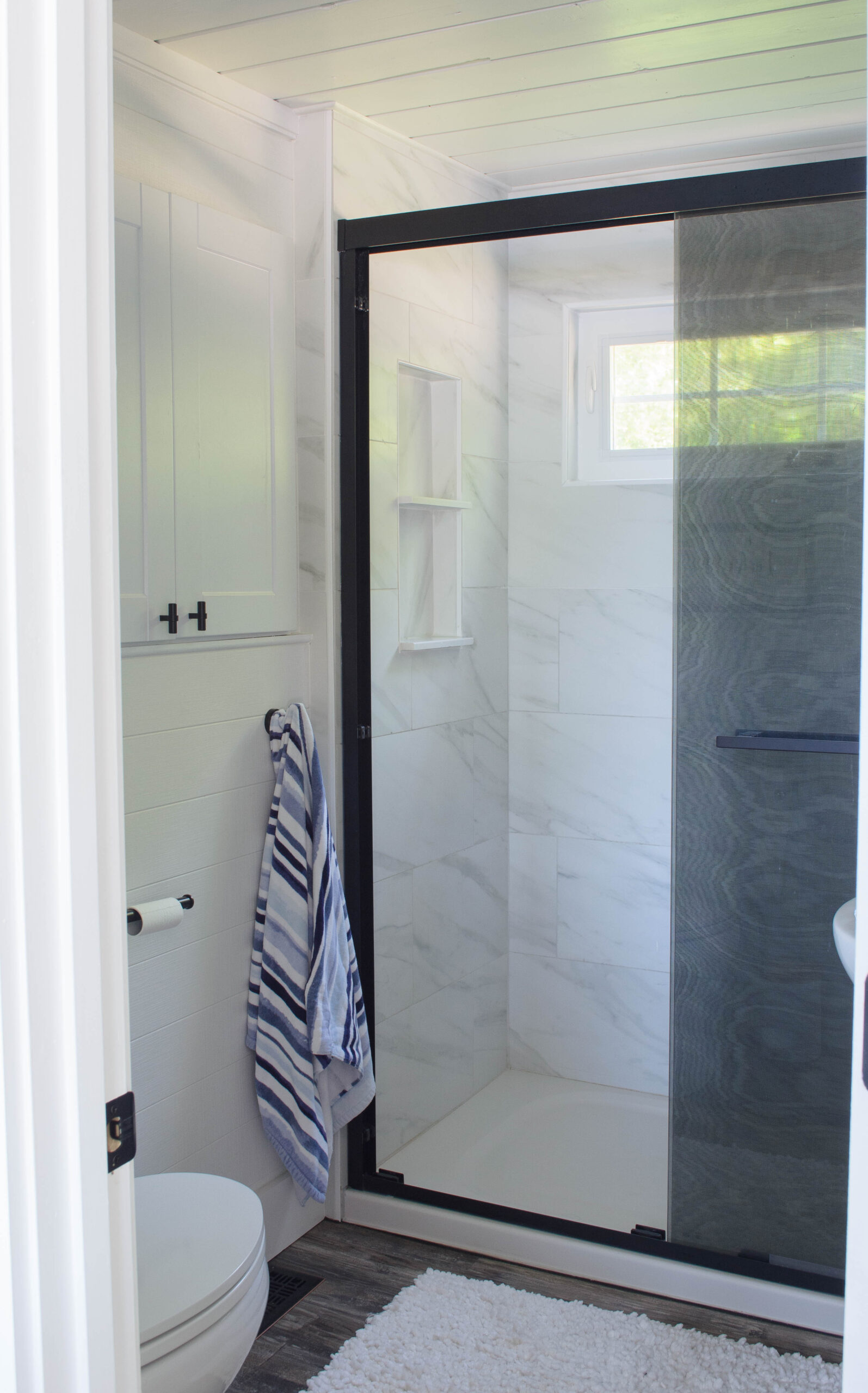 small bathroom remodel with walk in shower and custom tile